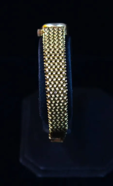 OMEGA Lady's Yellow Gold Woven Wristwatch
