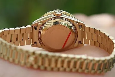 ROLEX LADIES PRESIDENT 18K YELLOW GOLD CHANNEL SET DIAMOND BEZEL GOLD DIAL 69178
