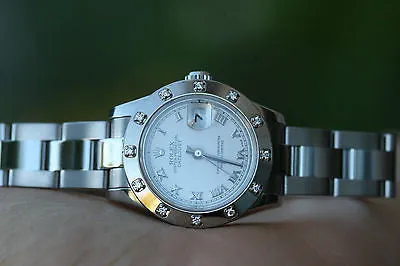 ROLEX LADIES STAINLESS STEEL DATEJUST 179174 12 DIAMOND BEZEL 26mm