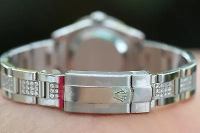 ROLEX LADIES STAINLESS STEEL DIAMONDS OYSTER BAND DIAMOND BEZEL DIAL UNWORN