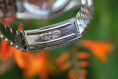 ROLEX MENS DATEJUST STAINLESS 16234 SILVER CONCENTRIC DIAL BLUE ARABIC NUMERALS