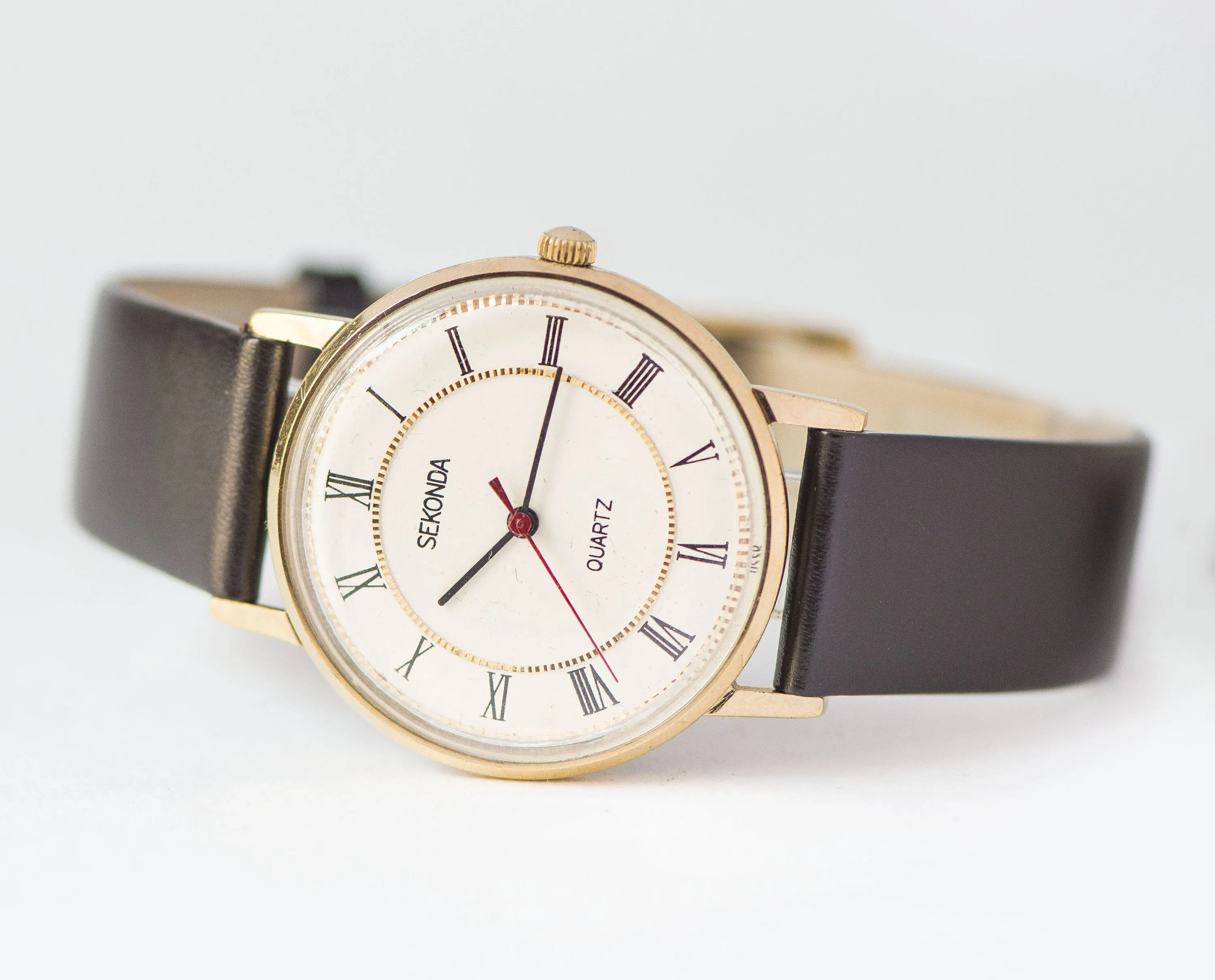 Slim unisex wristwatch quartz Sekonda gold plated. Men's watch Roman numerals. Quality mark tomboy watch gift. New premium leather band