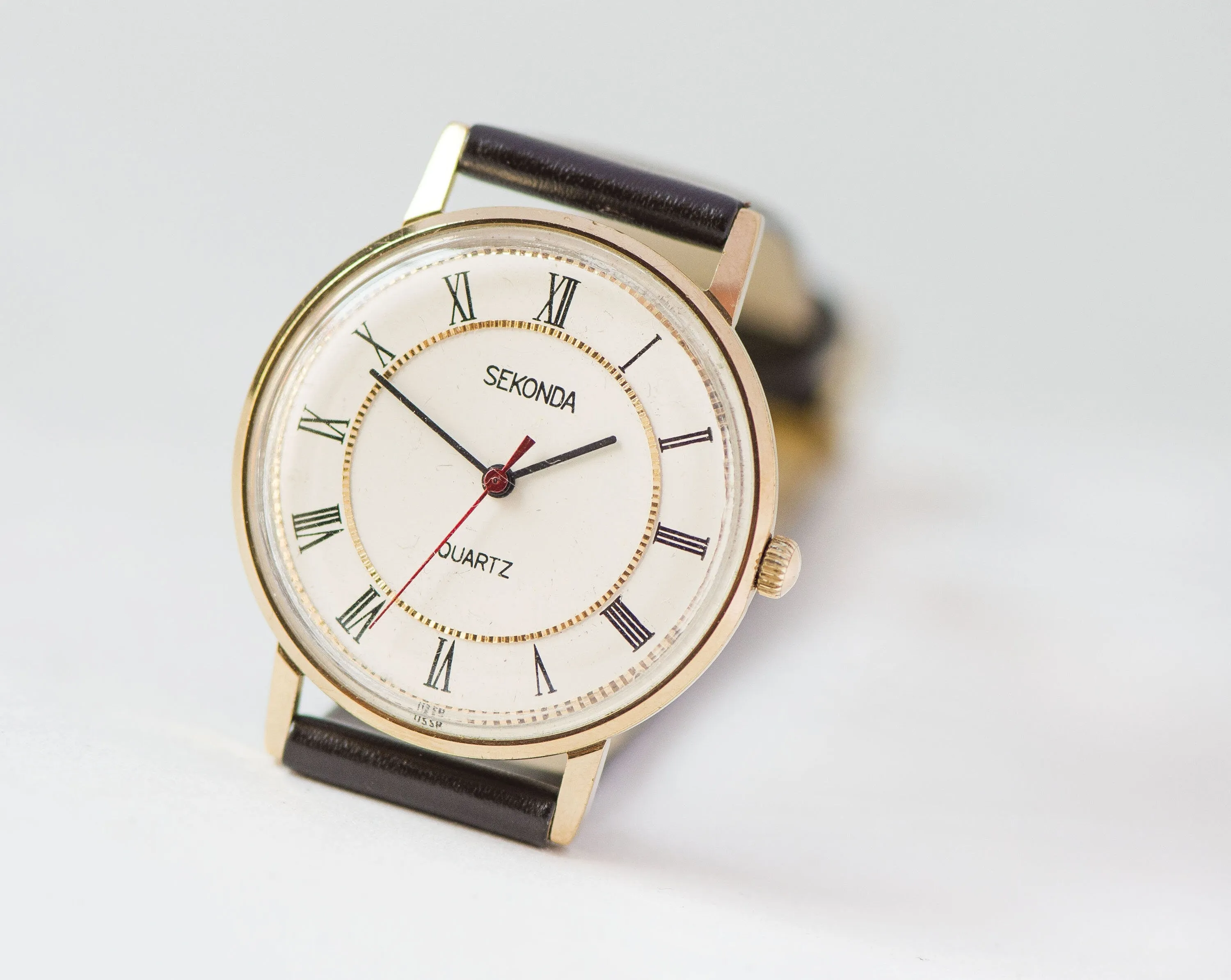 Slim unisex wristwatch quartz Sekonda gold plated. Men's watch Roman numerals. Quality mark tomboy watch gift. New premium leather band