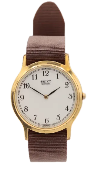 Vintage Seiko V700-8A10 Slim Dressy Men's Quartz Wristwatch Japan Gold Tone